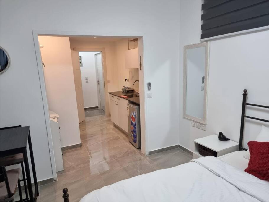 דירת זוּגַג מפנקת עם מרפסת משגעת ונוף למפרץ. Apartman Eilat Kültér fotó