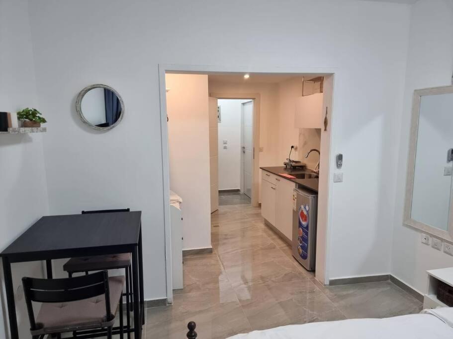 דירת זוּגַג מפנקת עם מרפסת משגעת ונוף למפרץ. Apartman Eilat Kültér fotó